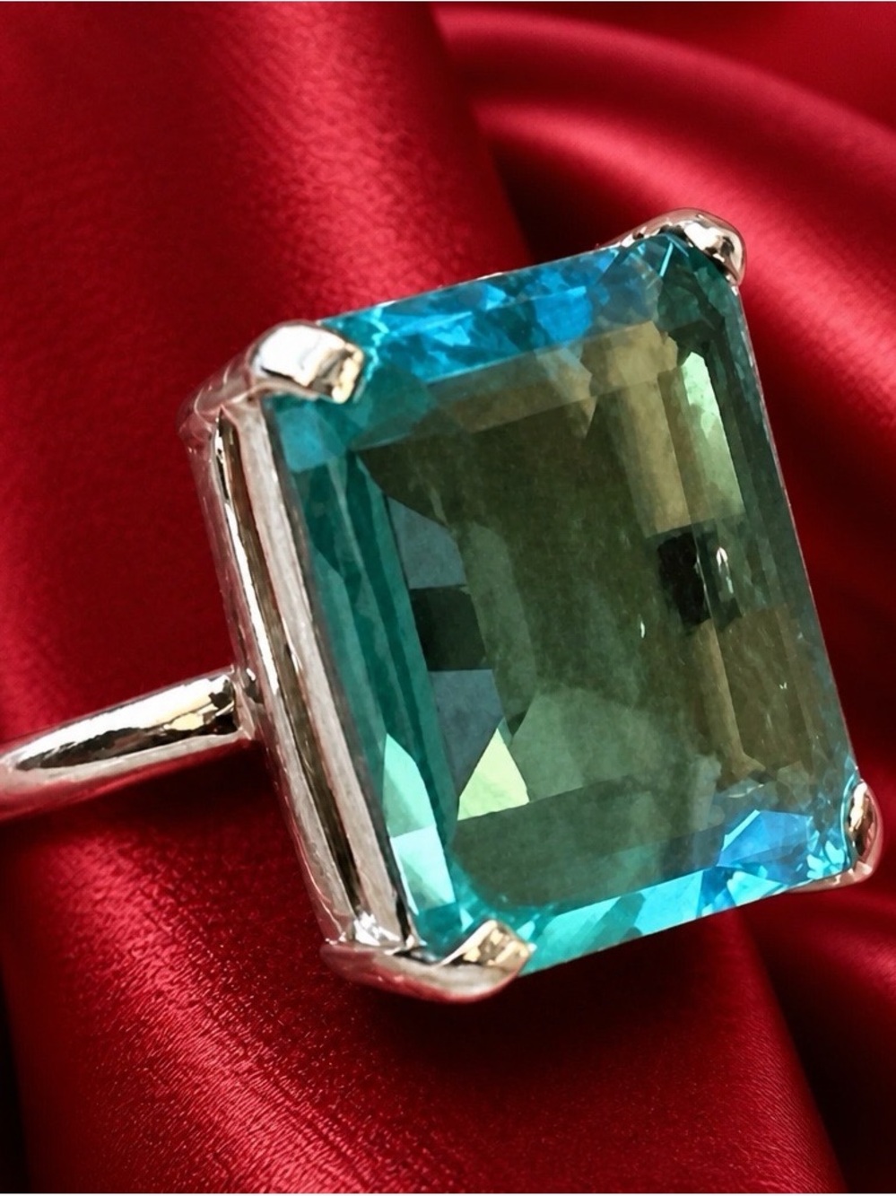 HUGE AAA 19ctw Genuine Emerald Cut Blue Topaz. Rhodium over 925 Sterling Silver